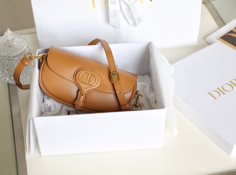 Is it OK to buy
 Dior Handbags Crossbody & Shoulder Bags Caramel Gold Vintage Cowhide Sweatpants