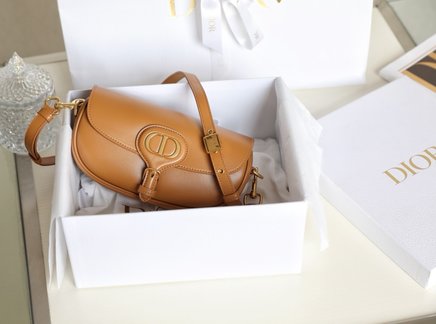 Is it OK to buy Dior Handbags Crossbody & Shoulder Bags Caramel Gold Vintage Cowhide Sweatpants