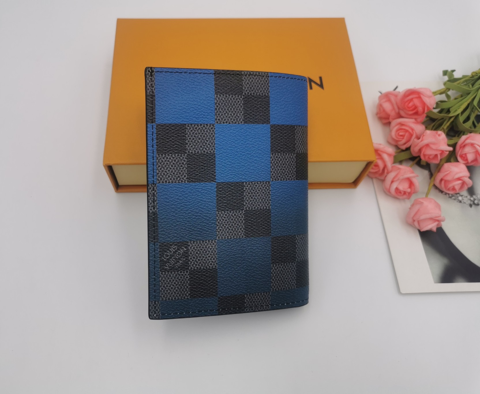 Front view of a luxury leather passport cover.