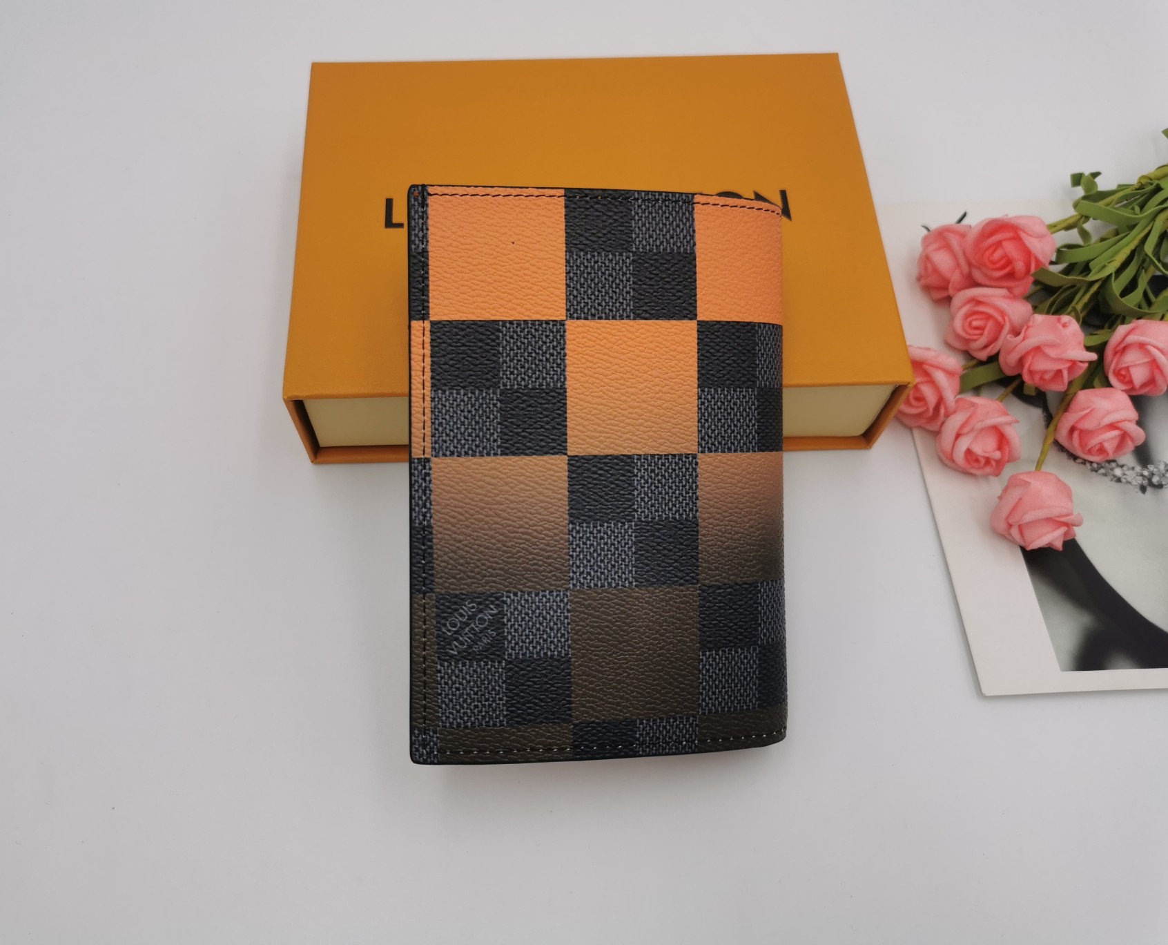 Opened slim leather passport wallet showing interior.