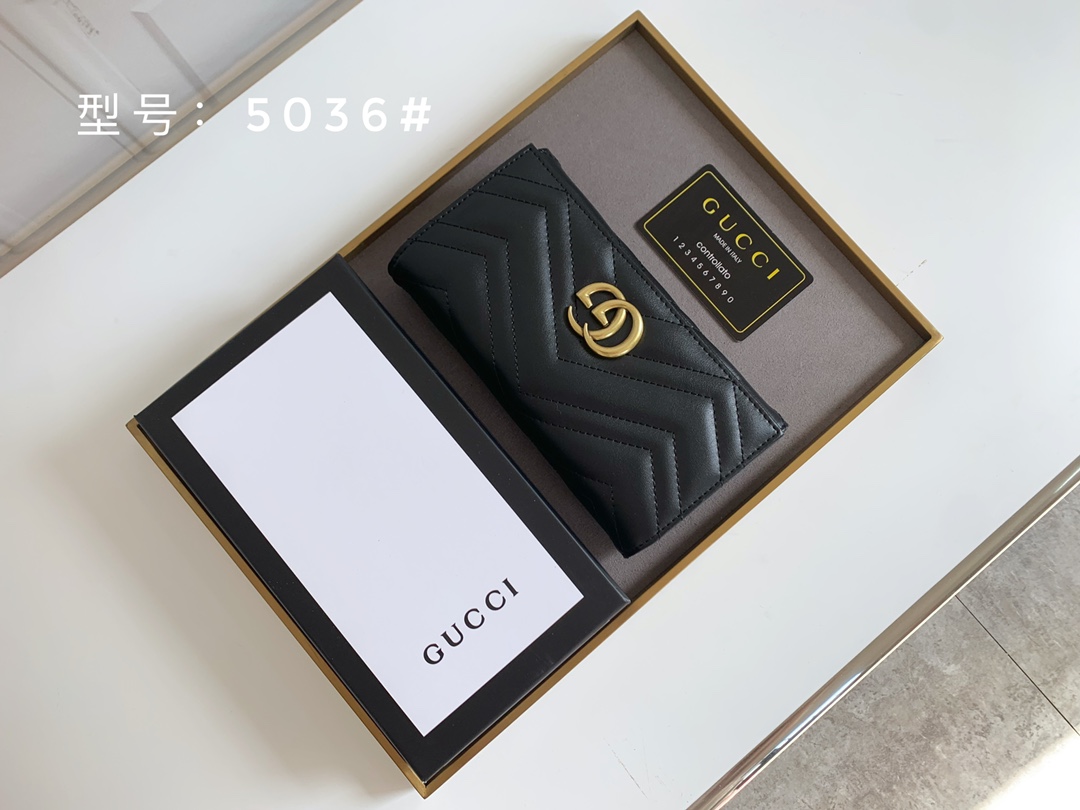 Gucci GG Marmont 長款財布 - 高品質な絞り込みレザーと人形花紋デザイン