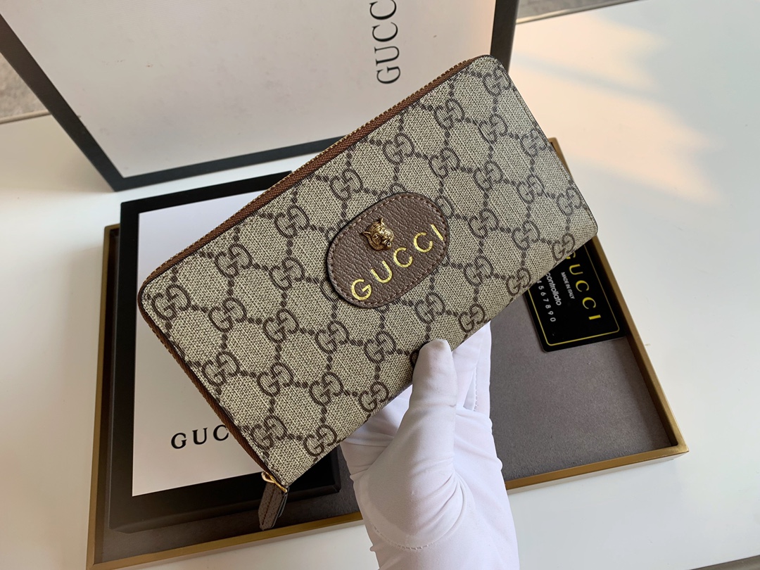 Gucci ヴィンテージ風トラベルラベル付きシングルファスナー財布