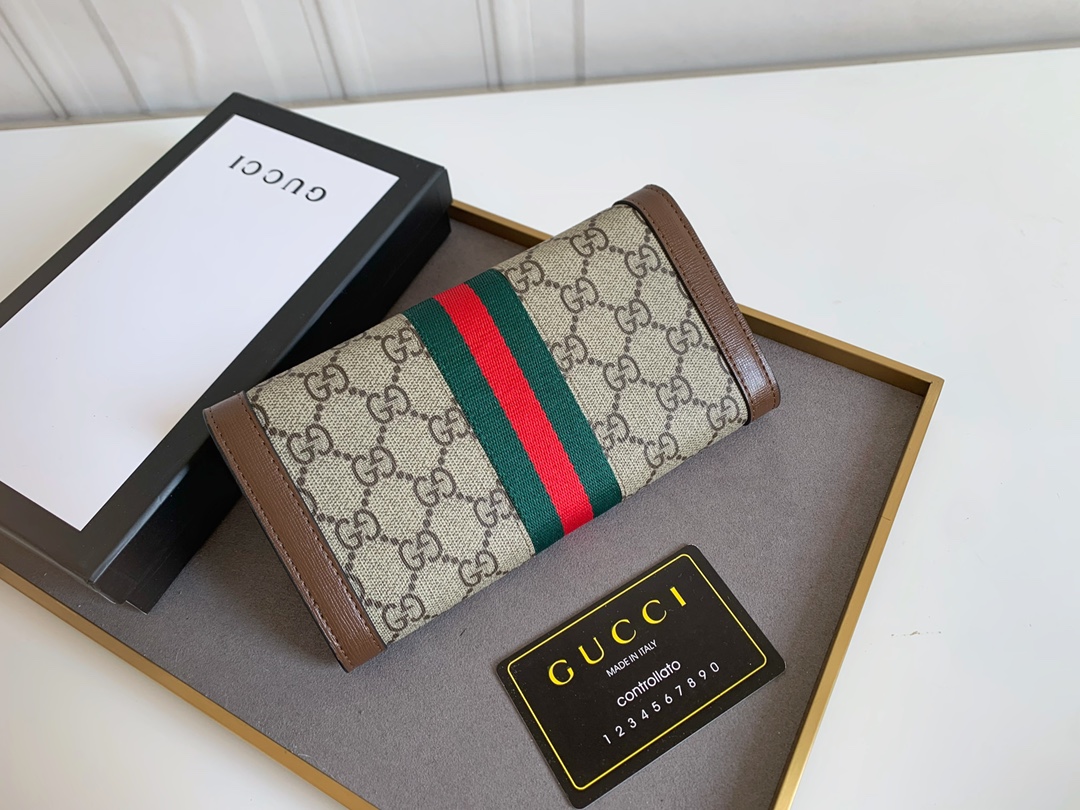 Gucci GGロゴラウンドジップポーチ - クラシックで洗練されたデザイン