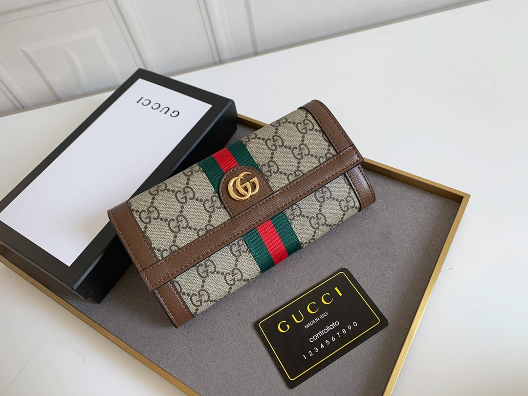 Gucci GGロゴラウンドジップポーチ - クラシックで洗練されたデザイン