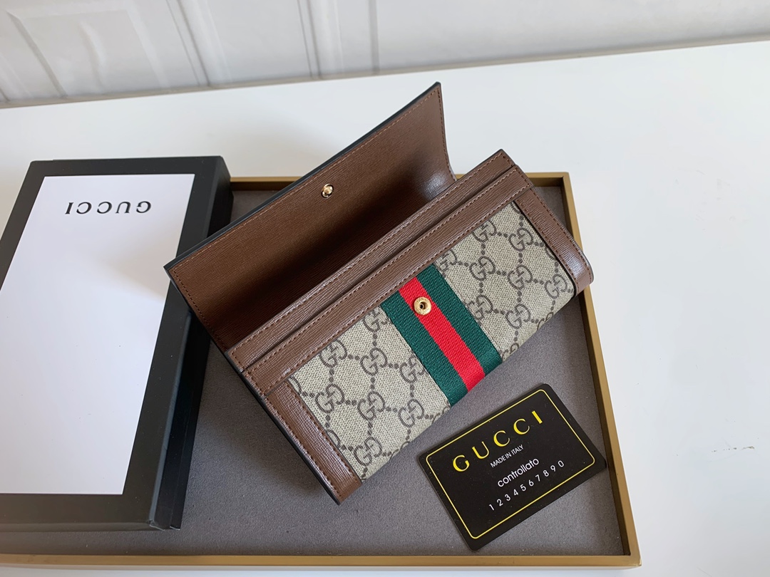 Gucci GGロゴラウンドジップポーチ - クラシックで洗練されたデザイン