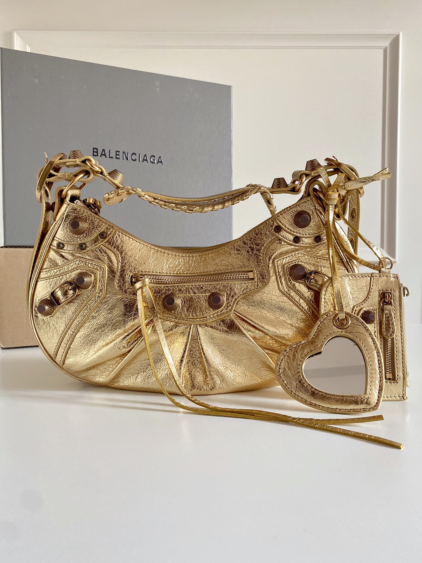 “Balenciaga Le Cagole Large Gold Bike Pack Review”