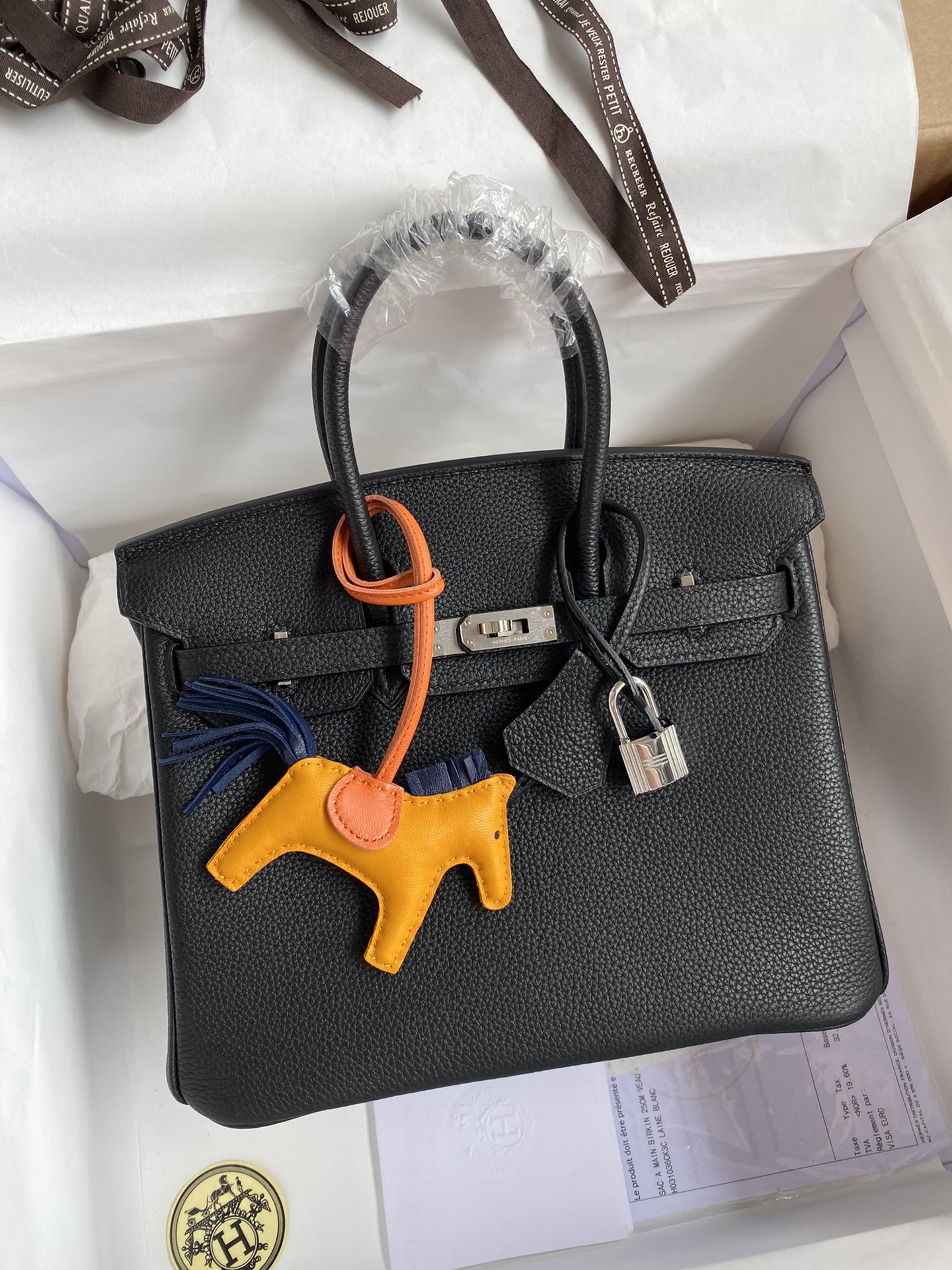 Birkin 25cm piel Togo importada negro herrajes dorados y plateados