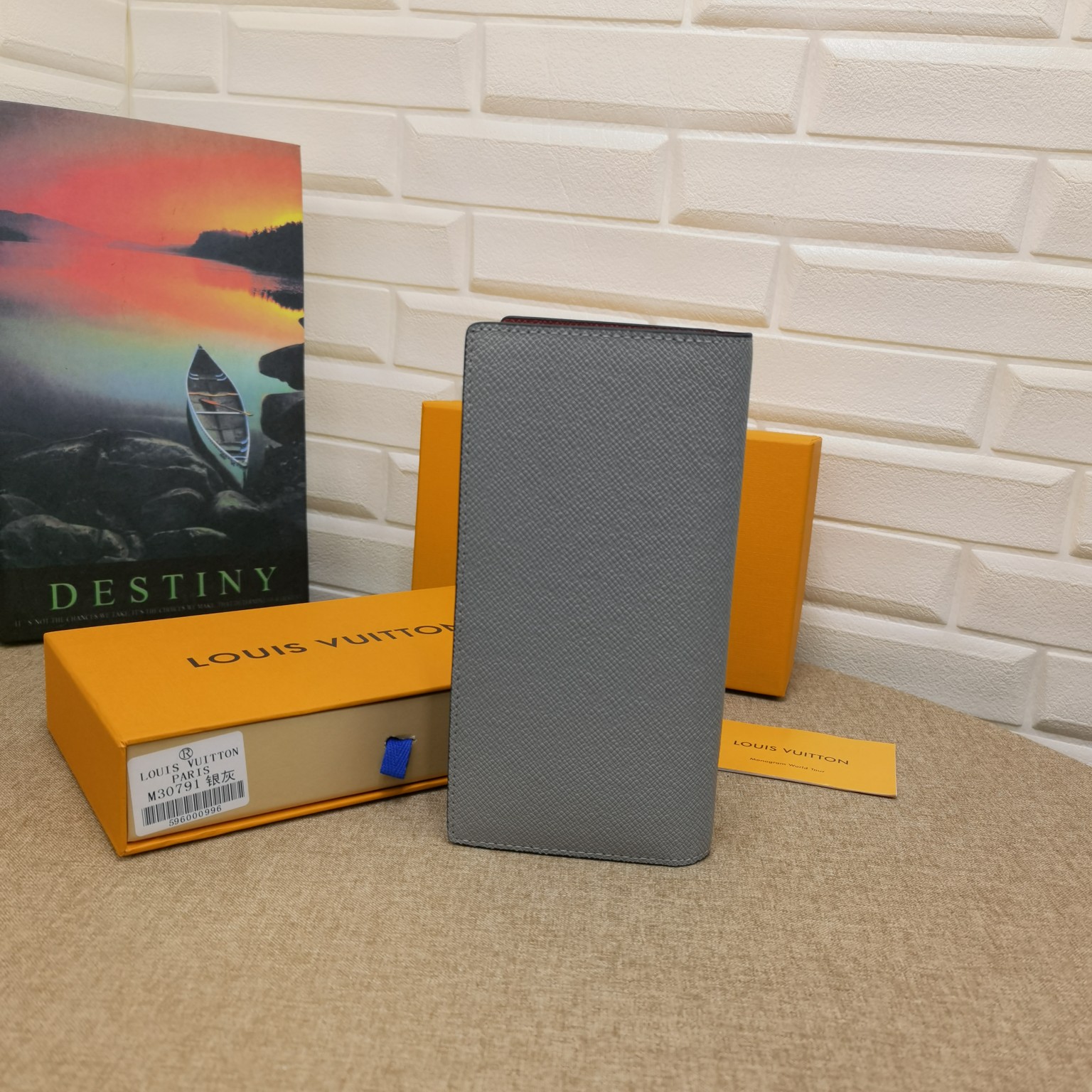 Back view of a brown leather bifold wallet