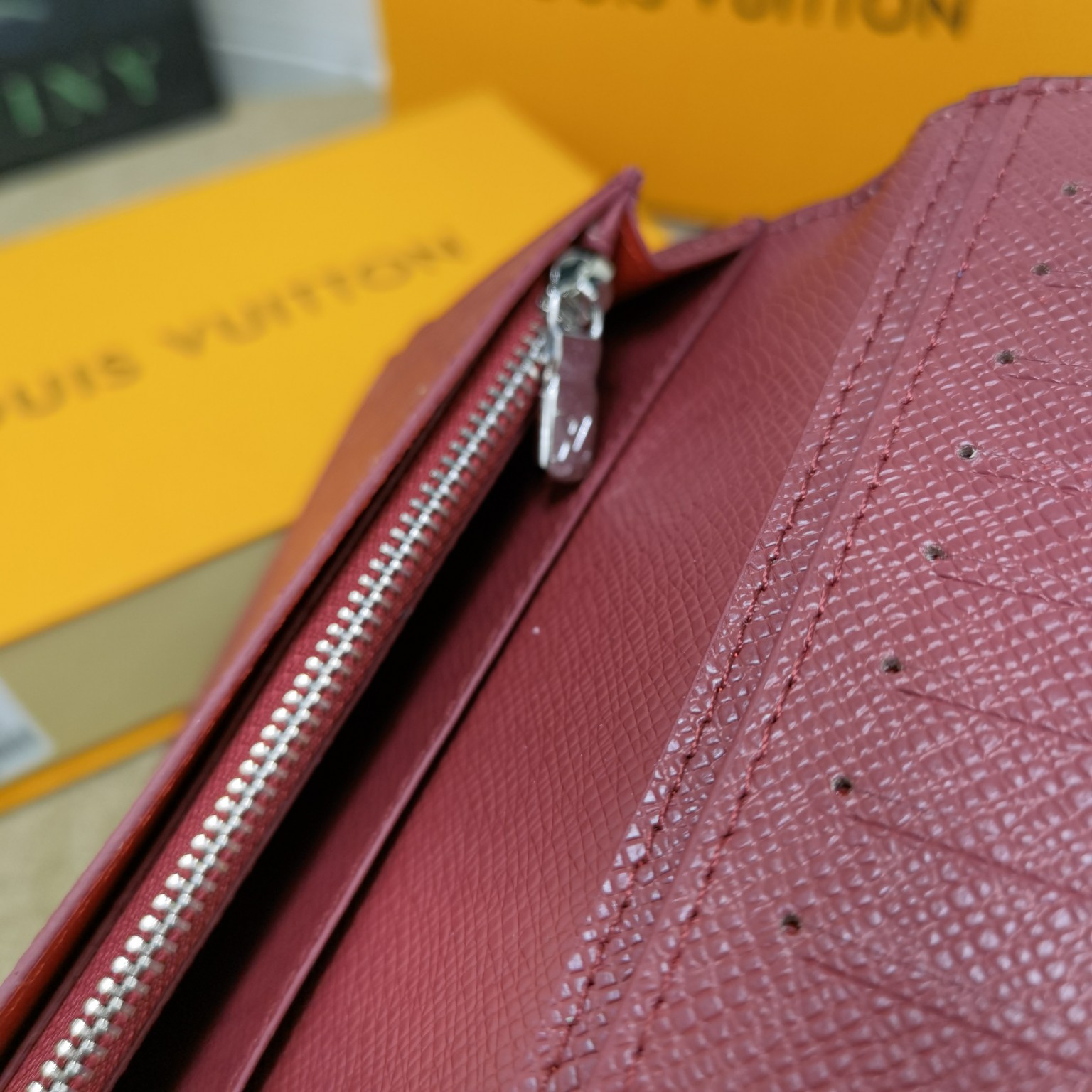 Leather bifold wallet in packaging