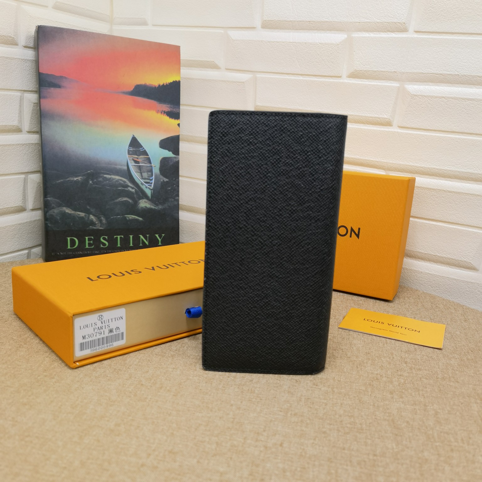 Back view of a minimalist leather bifold wallet