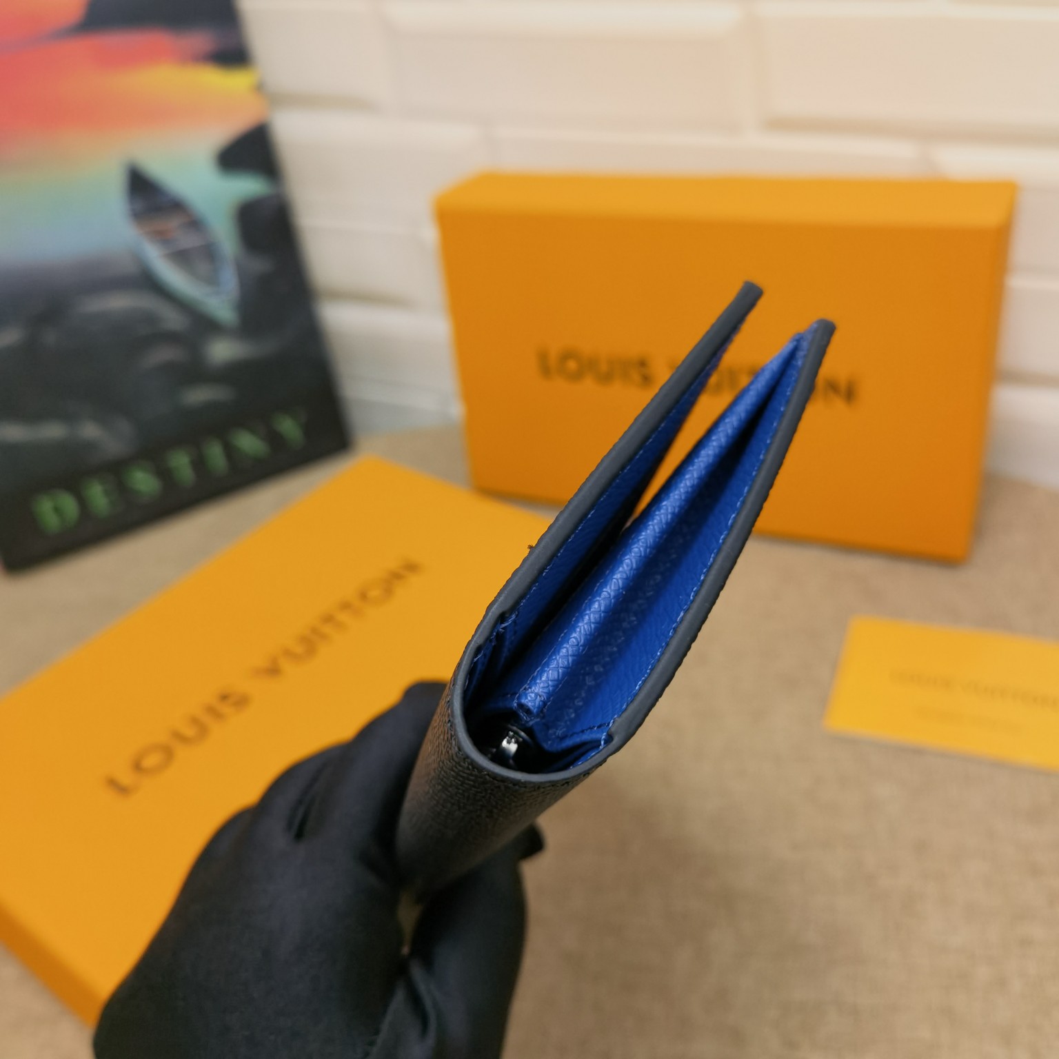 Minimalist leather bifold wallet in packaging