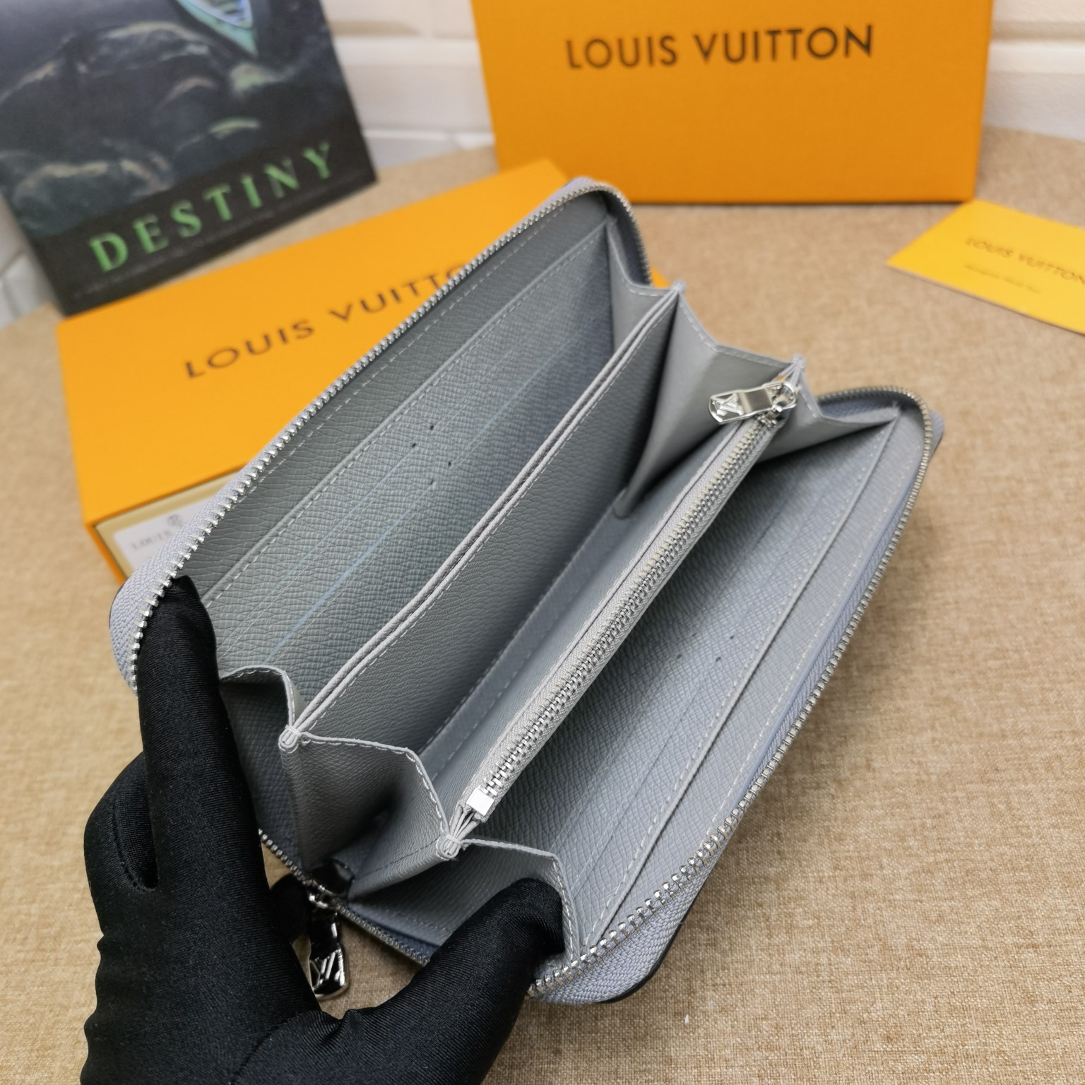 Leather long zip wallet in hand