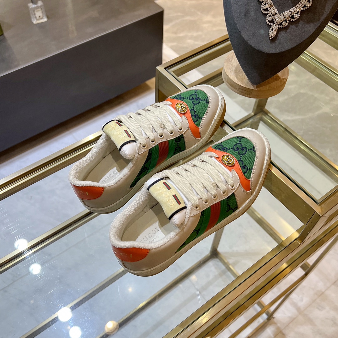ex fábrica Gucci. zapatos sucios tela doble G naranja y verde cincha roja y verde detalle piel naran