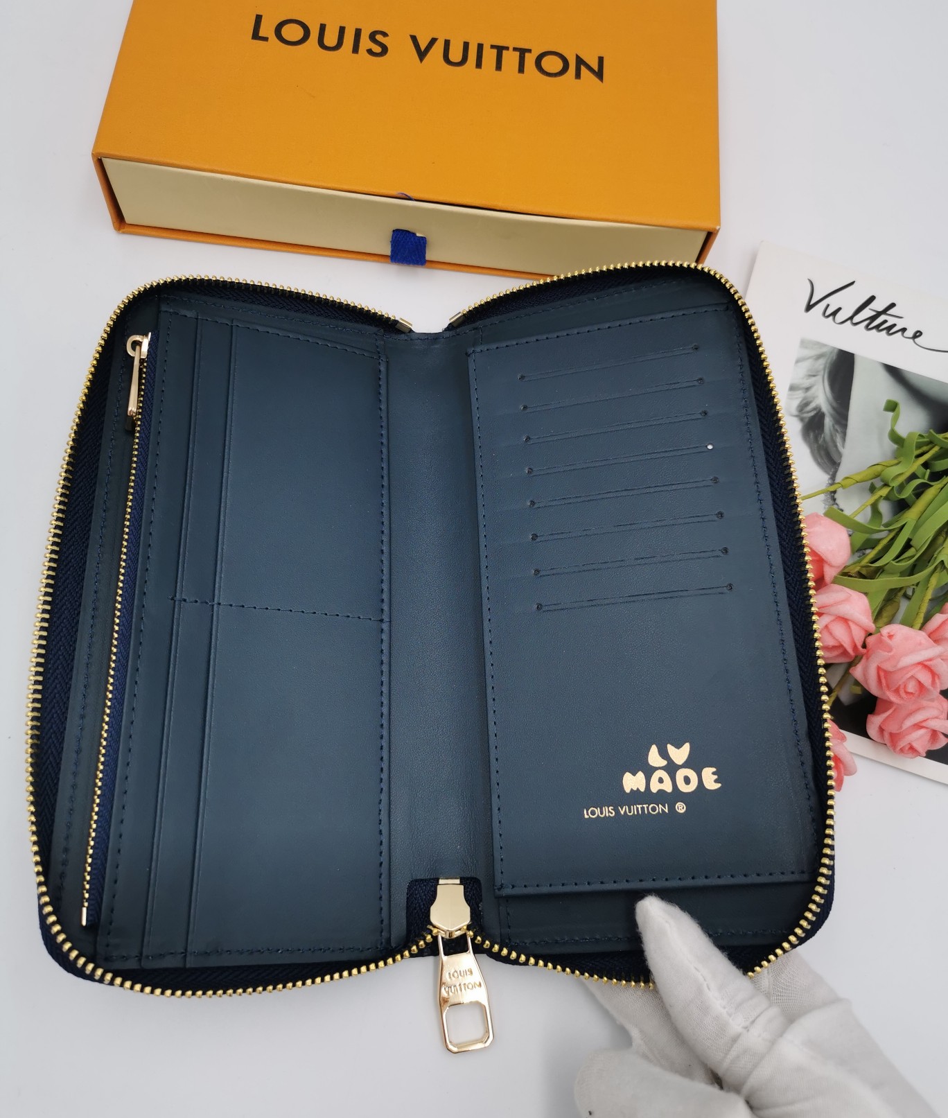 Person holding leather wallet