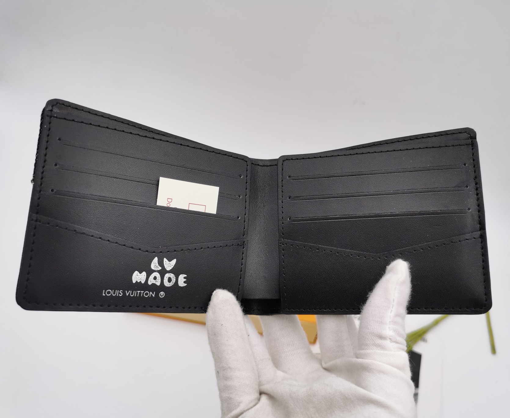 Leather bifold wallet interior with card slots and bill compartment