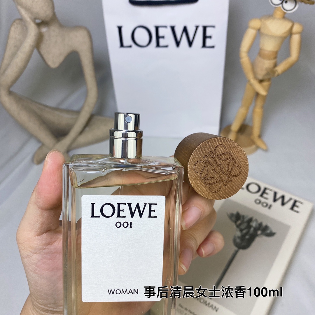 Loewe 001 Woman Eau de Parfum - 100ml - Citrus, Floral, and Woody Scent 8 i1640593971 4896 7