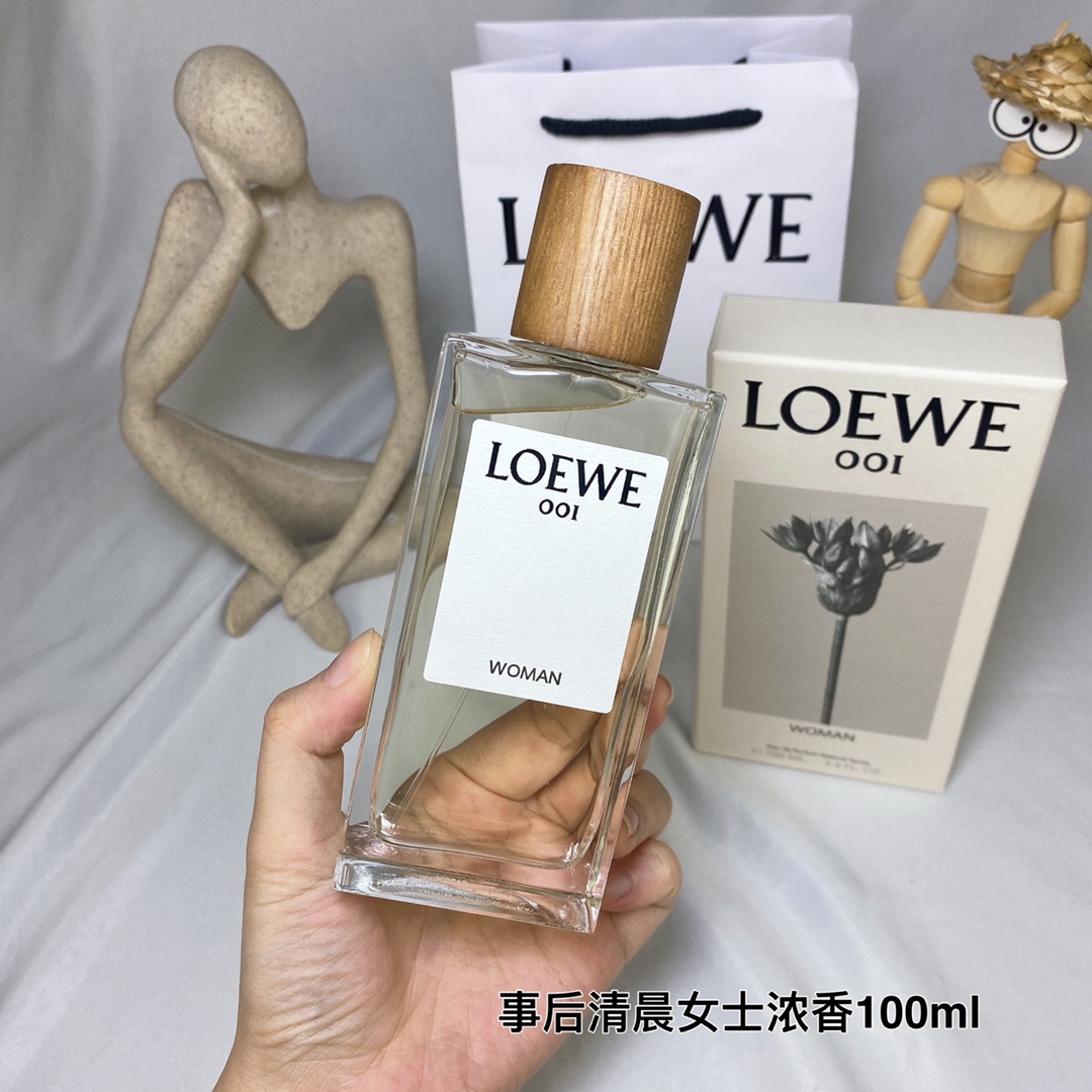 Loewe 001 Woman Eau de Parfum - 100ml - Citrus, Floral, and Woody Scent 2 i1640593971 6171 1