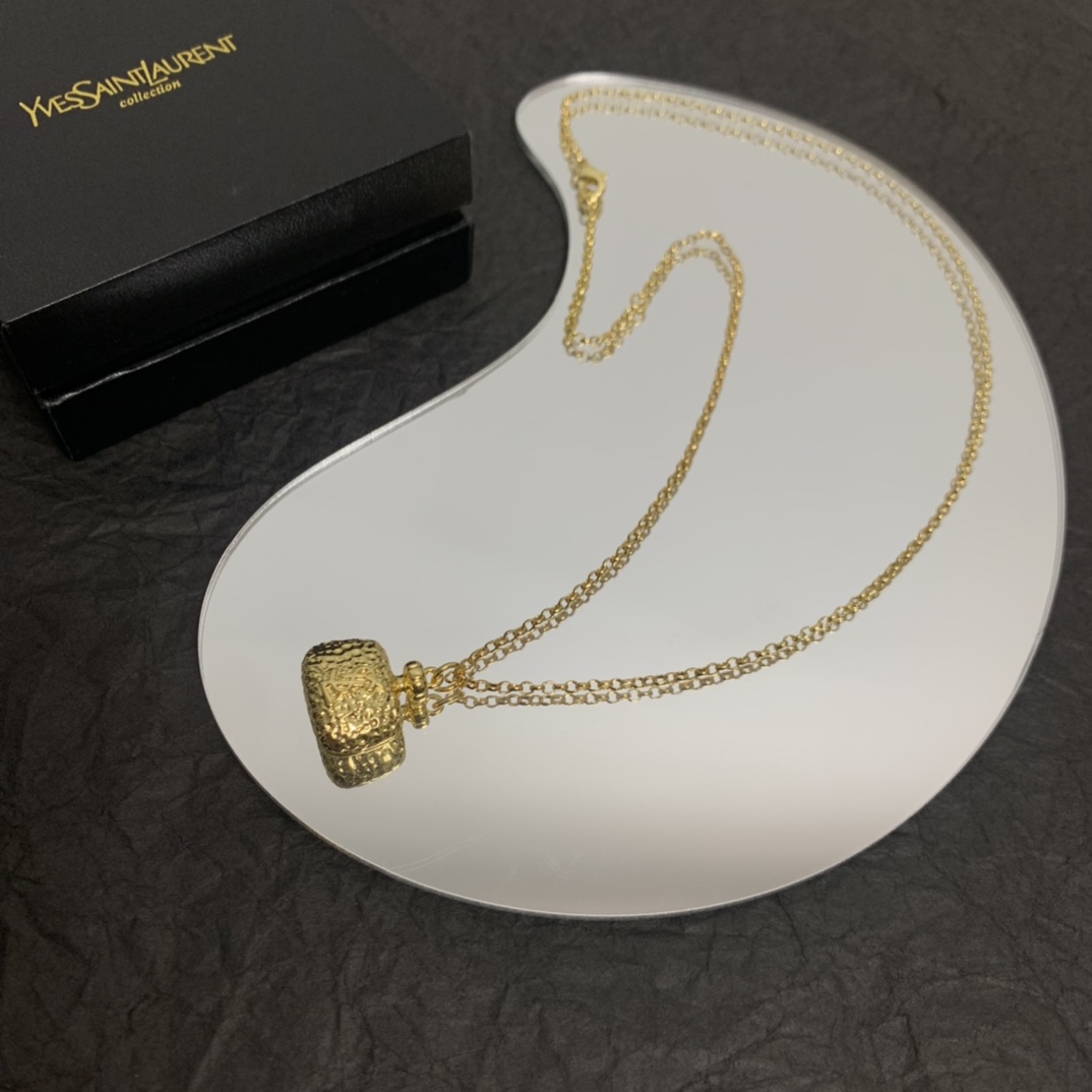 Yves Saint Laurent Jewelry Necklaces & Pendants Yellow Brass
