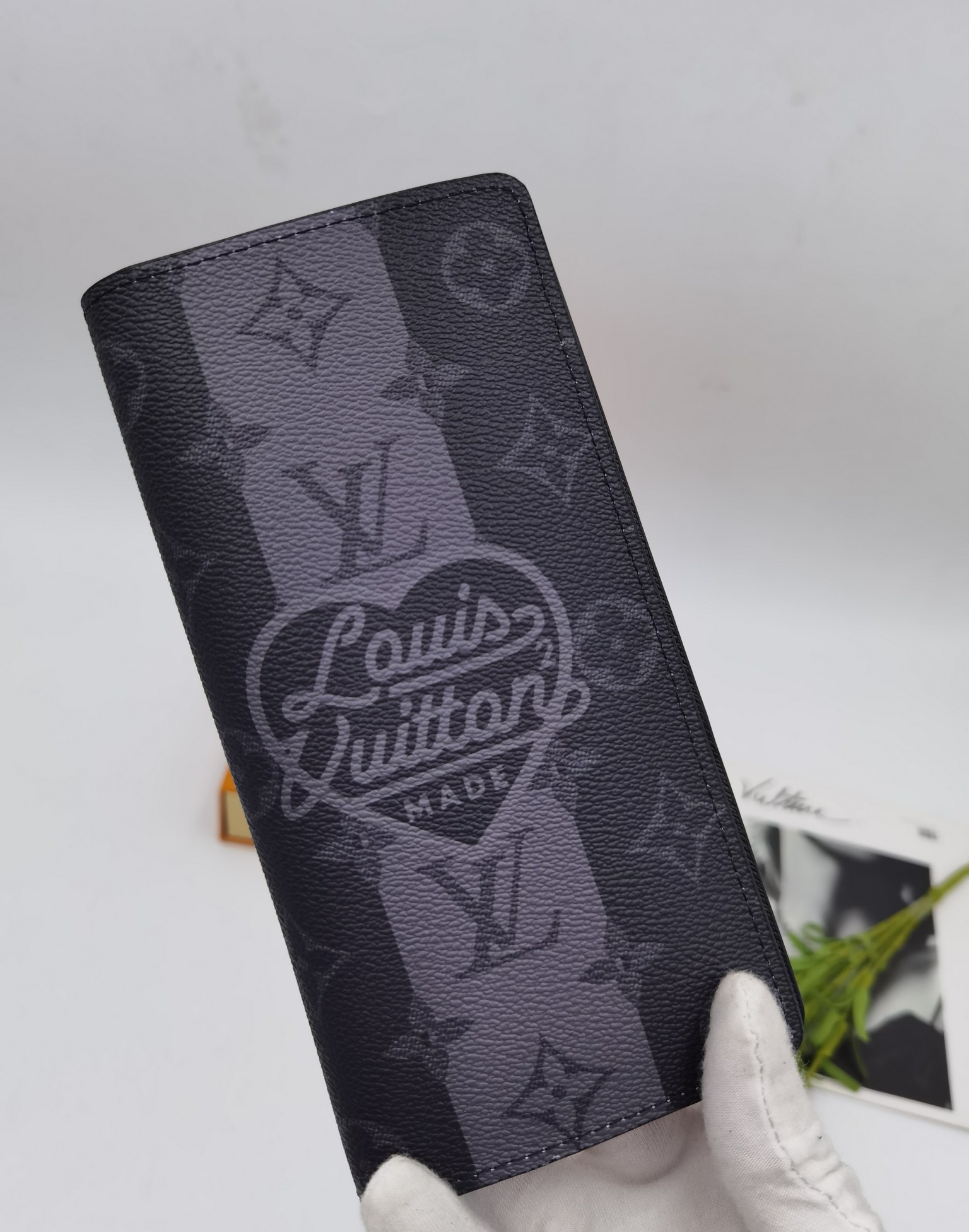 Leather wallet open showing card slots and compartments