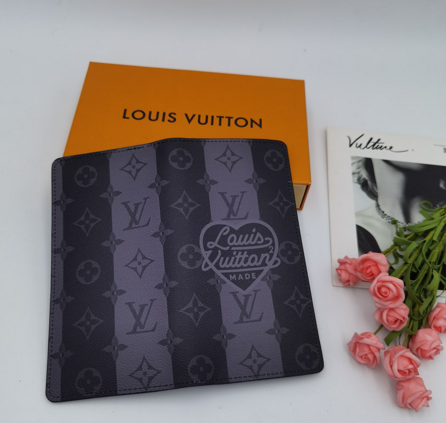 Wallet in use, holding cash and cards