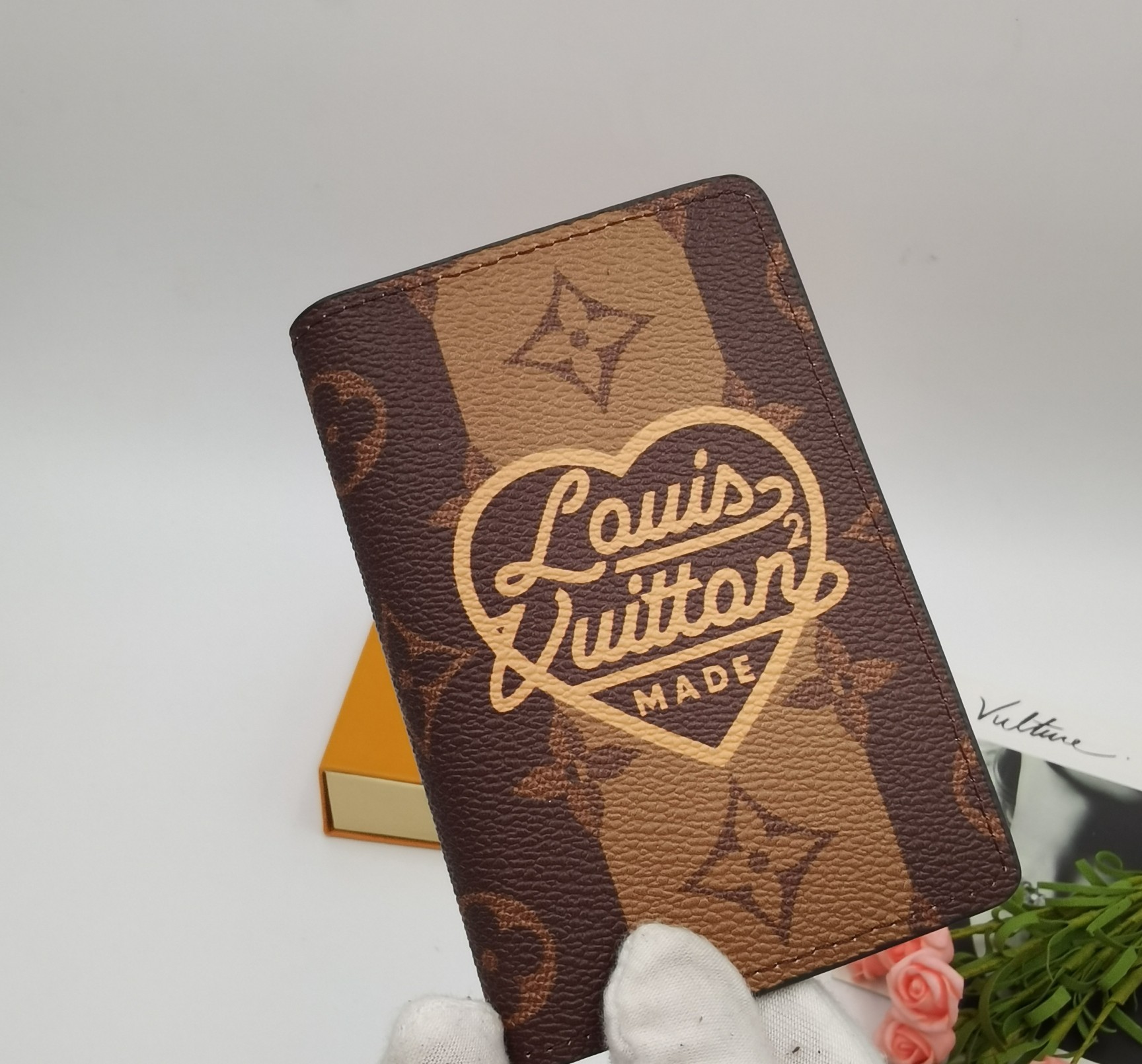 Luxury leather card holder open, showing card slots