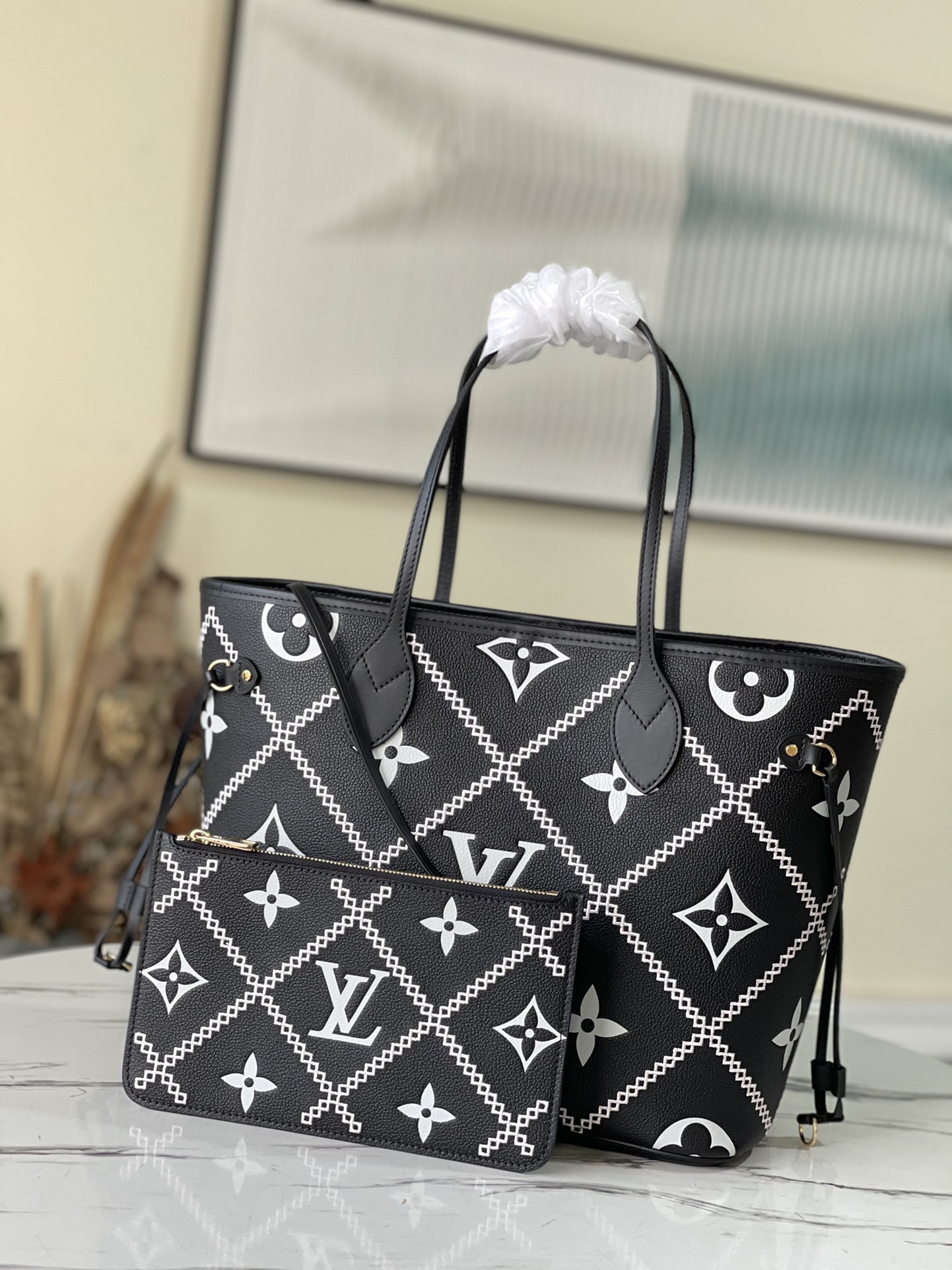 Louis Vuitton Neverfull MM Monogram Empreinte Leather in Black - WOMEN - Handbags M46040