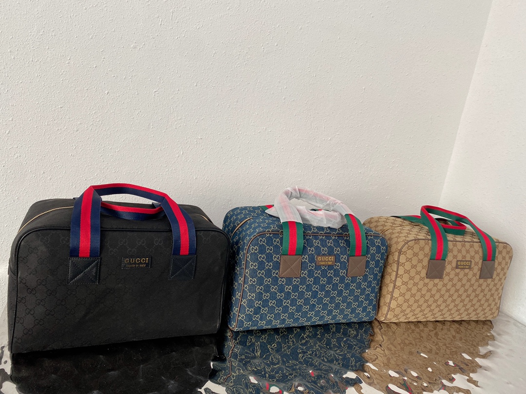 Gucci 古奇   GG 帆布旅行袋 机场包 行李包 手提包袋 休闲百搭 采用精湛镶嵌细工，实物拍摄 原厂原版面料 配送小票防尘袋 40 x 25 cm。