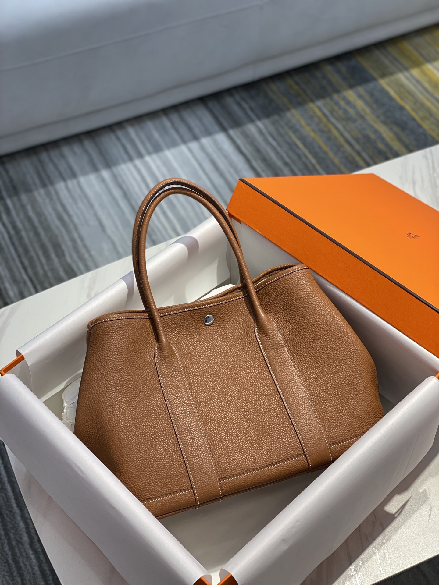 Hermès Garden Party 36 CM Gold Brown Tote Bag with Snap Closure 2 i1642067370 9750 1