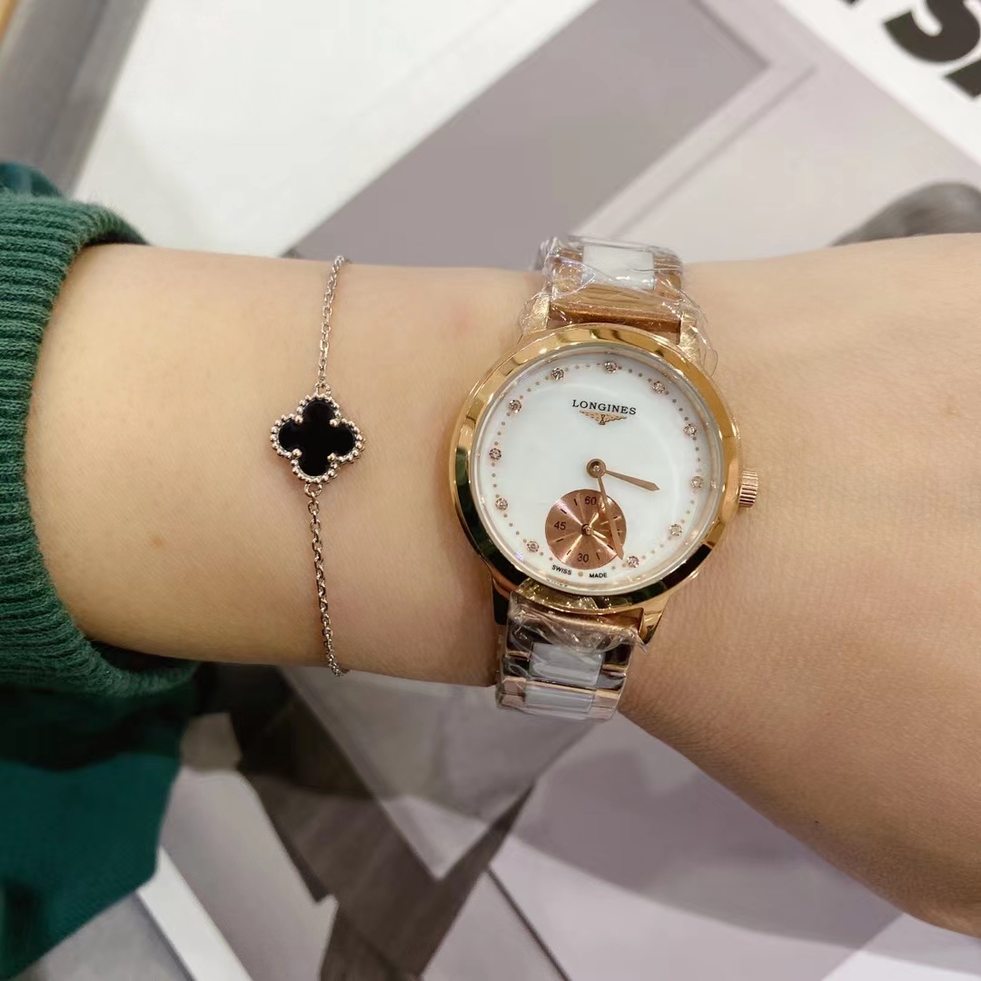 K0 陶瓷. 浪琴  Longines  原装进口石英机芯 小秒设计 钢化玻璃 316L精钢表壳 直径女30mm 厚8mm如果今天的阳光停止了它耀眼的光芒。那么你的一个微笑，将照亮我的整个世界 实物拍摄品质如一