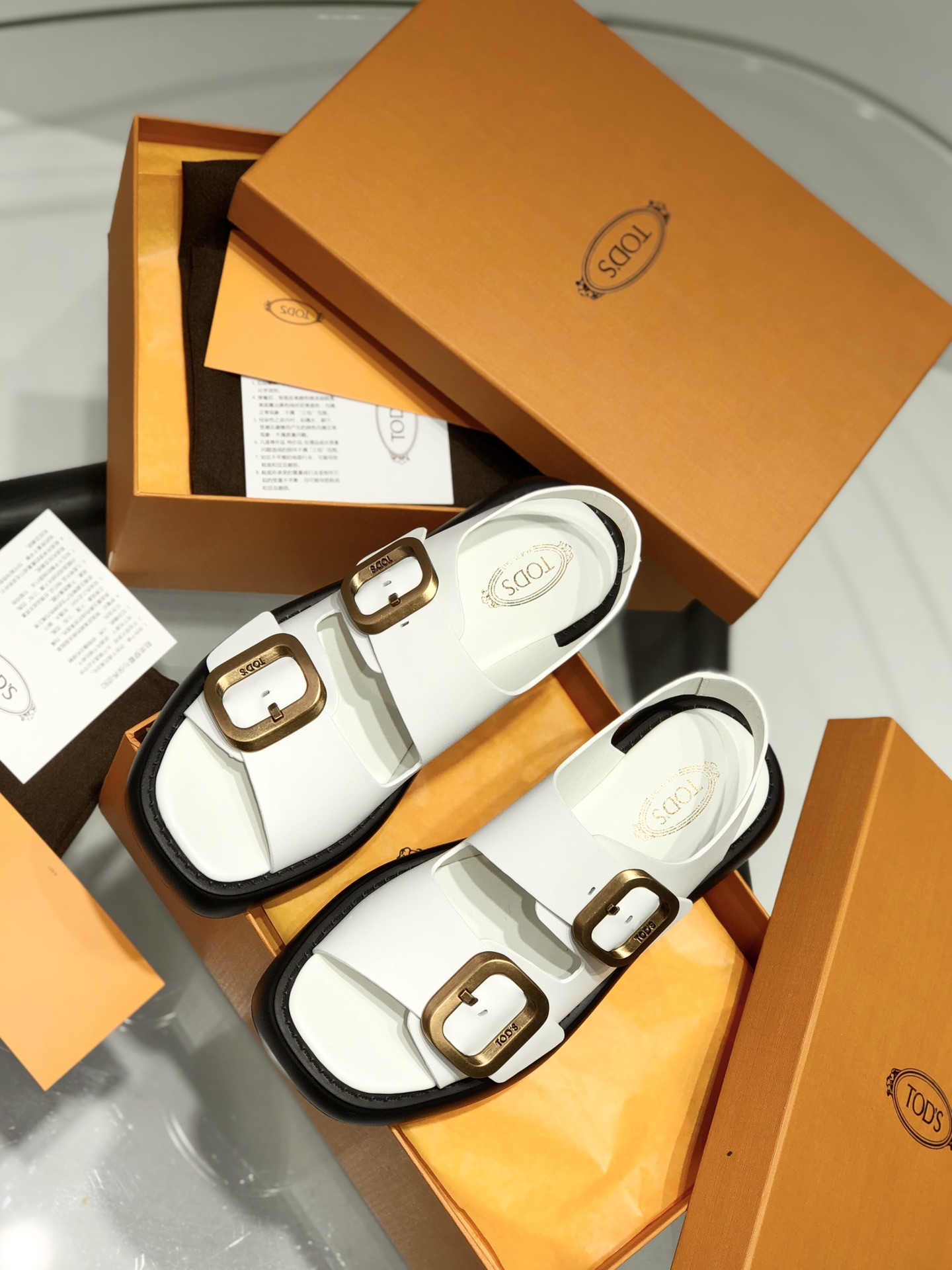 TOD’S Faux
 Chaussures Sandales Cuir de vache Peau mouton Collection printemps – été