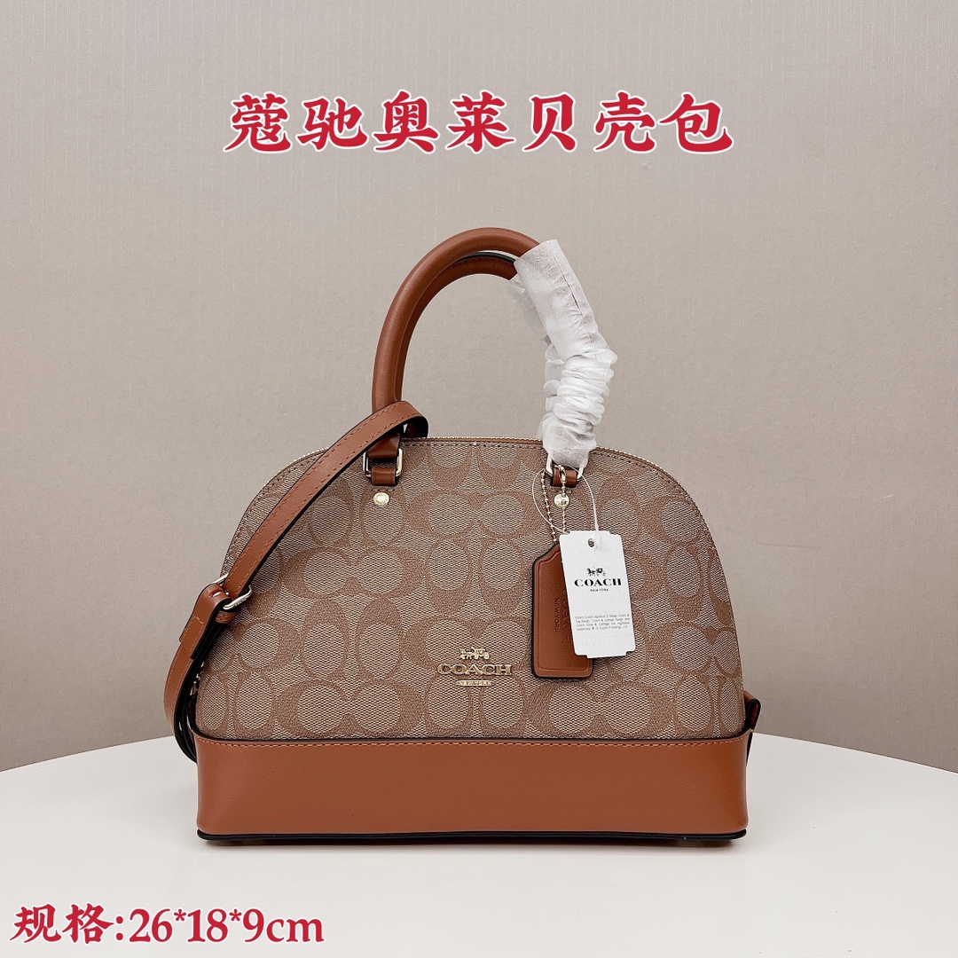 Coach蔻驰奥莱贝壳包💰220 专柜原单品质.好看实用.coach入门款. 容量宽大.包型挺括.手提瞬间拉满气质. 标配可斜挎长肩带.规格:26*18*9cm