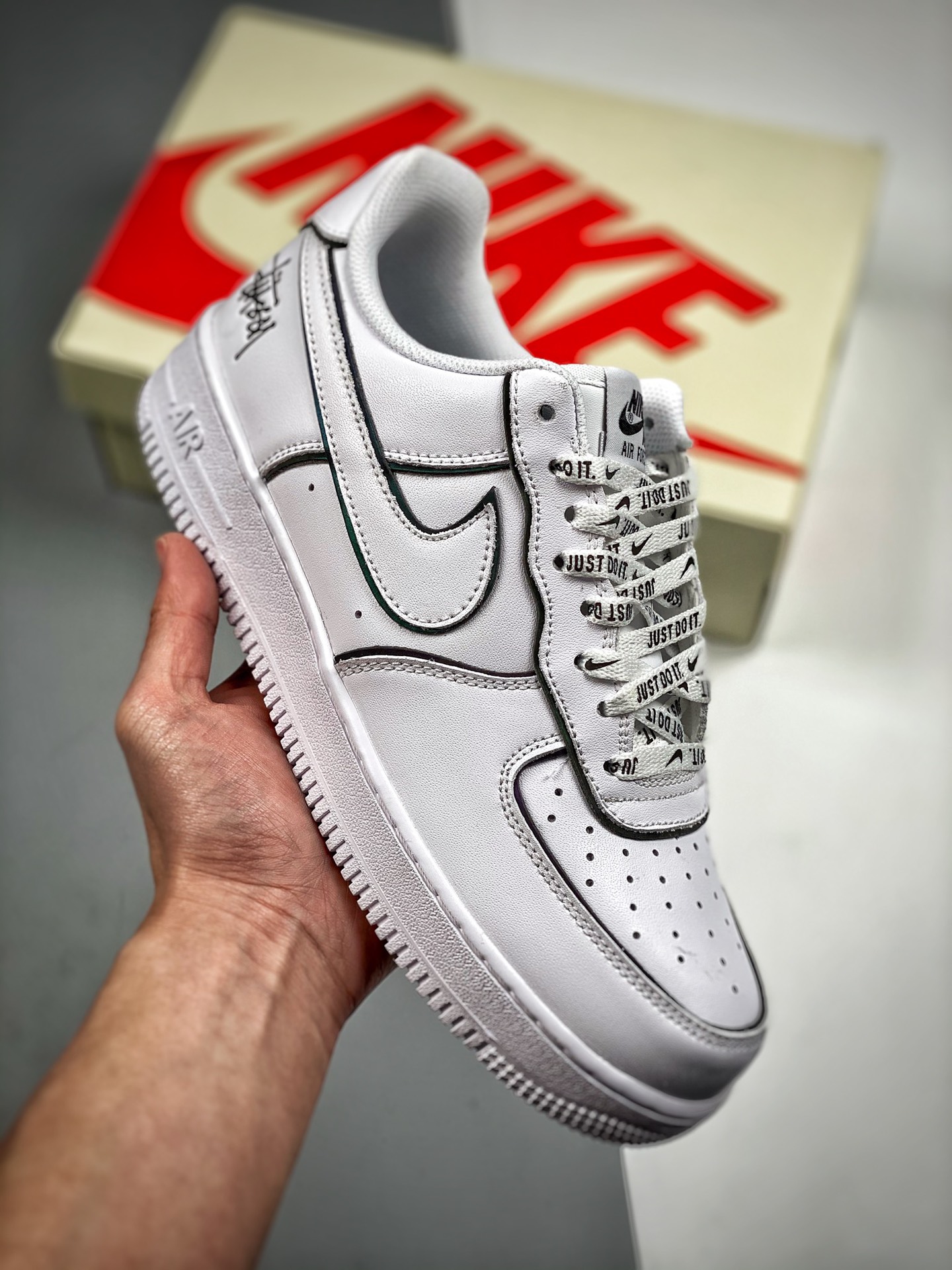 Nike Air Force 1 Low Edición Stussy, blanco con reflejos brillantes, horma original y cartón original para crear la aut…