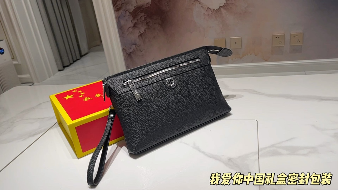 K5 古驰 高端100%头层纯牛皮商务手拿包 原版五金配件 帆布内里整包全皮附带暗兜 六卡位 更加结实耐磨 简洁大方 送礼自留皆首选规格：28-18-3cm 男人用的包品质决定品味跨境及直播电商网红供应 量大来谈 各种男女包订制我爱你中国礼盒包装