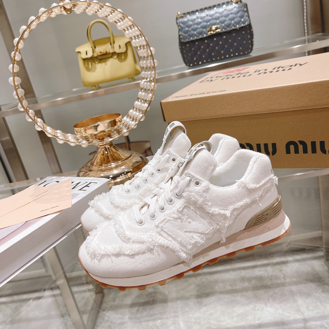 . "Exclusiva versión superior" 2022 primavera y el verano de la última ráfaga de Miumiu x New Balanc