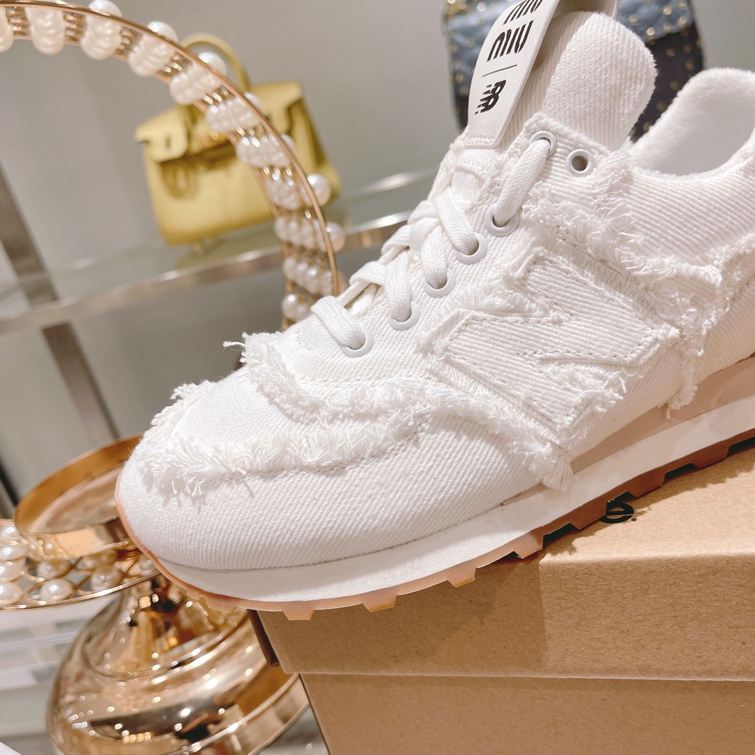 . "Exclusiva versión superior" 2022 primavera y el verano de la última ráfaga de Miumiu x New Balanc