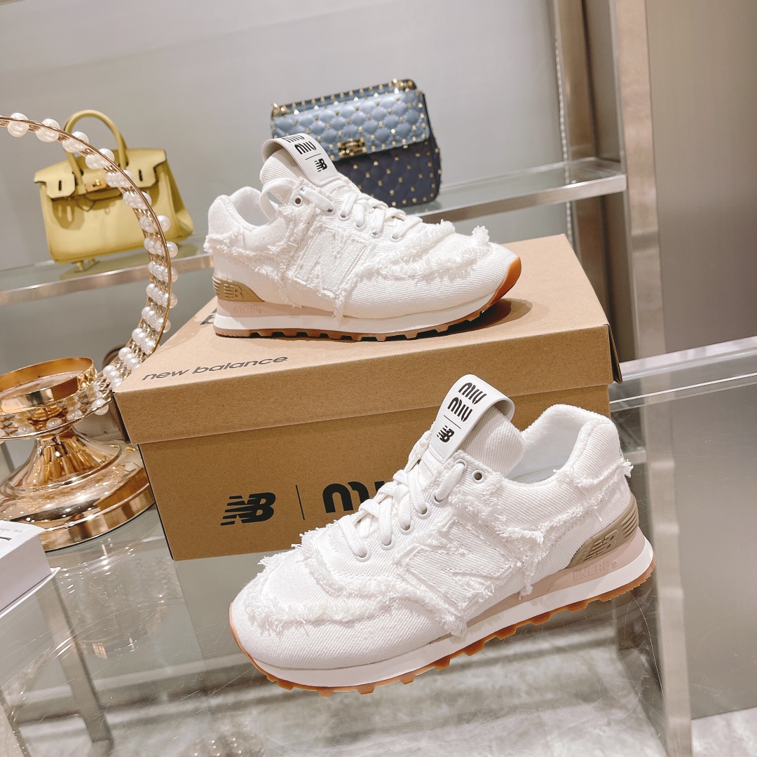 . "Exclusiva versión superior" 2022 primavera y el verano de la última ráfaga de Miumiu x New Balanc