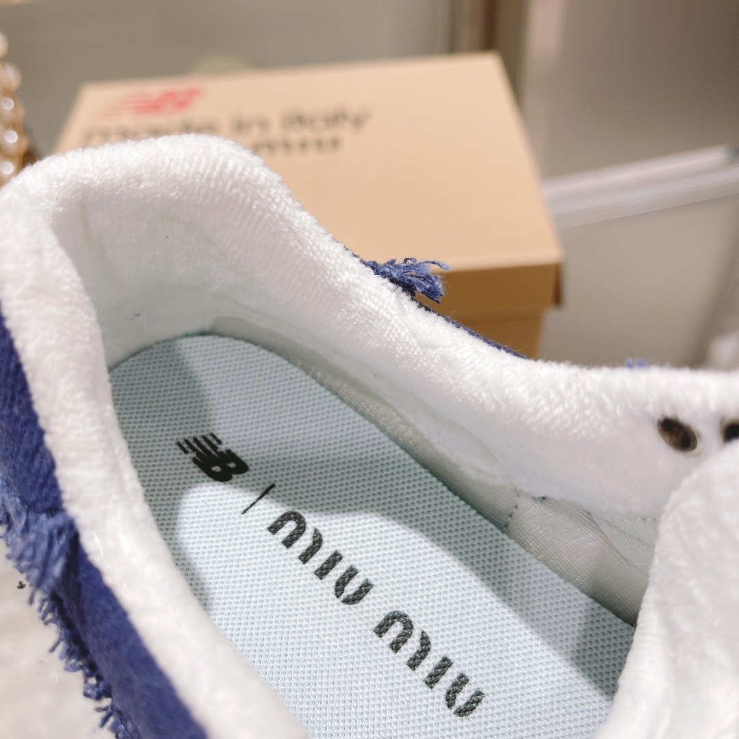 . "Exclusiva versión superior" 2022 primavera y el verano de la última ráfaga de Miumiu x New Balanc