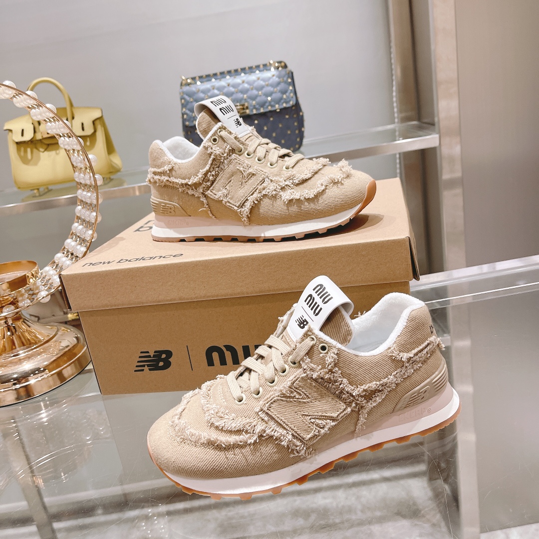 . "Exclusiva versión superior" 2022 primavera y el verano de la última ráfaga de Miumiu x New Balanc
