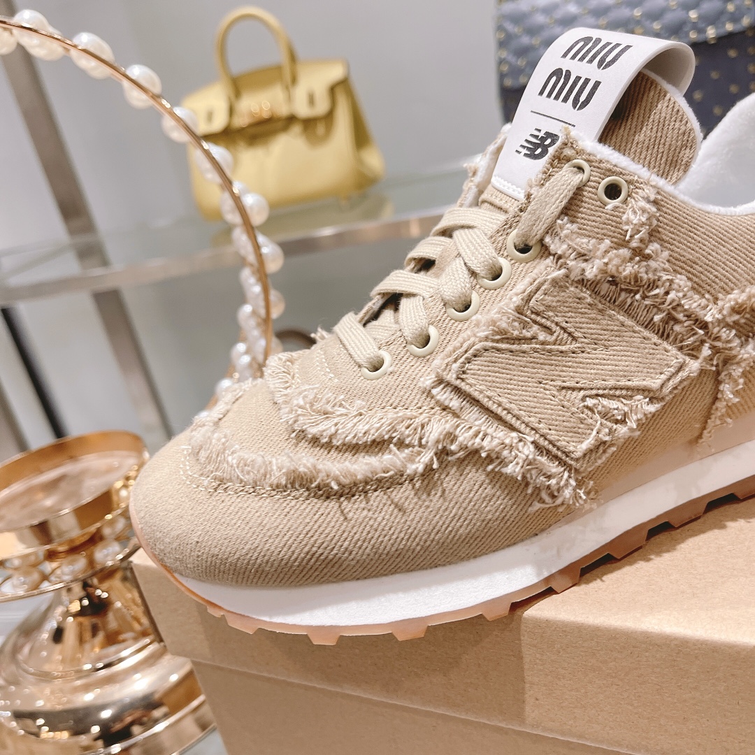 . "Exclusiva versión superior" 2022 primavera y el verano de la última ráfaga de Miumiu x New Balanc