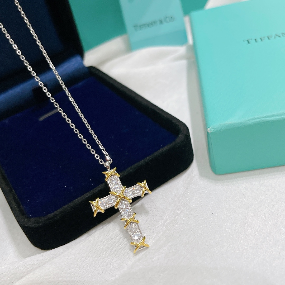 Tiffany & Co. Cross Pendant Necklace in Silver and Gold with Diamonds 3 i1647934953 4959 1