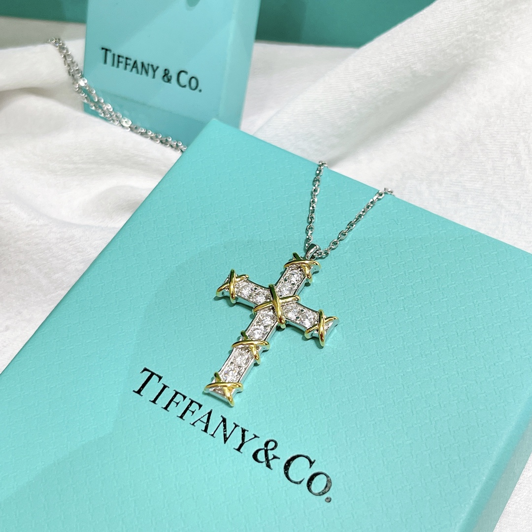 Tiffany & Co. Cross Pendant Necklace in Silver and Gold with Diamonds 6 i1647934953 9801 3