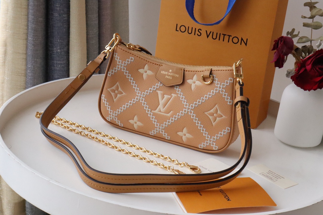 Louis Vuitton LV Easy Pouch On Strap Handbags Clutches & Pouch Bags Brown Embroidery Empreinte​ Cowhide Chains M81137