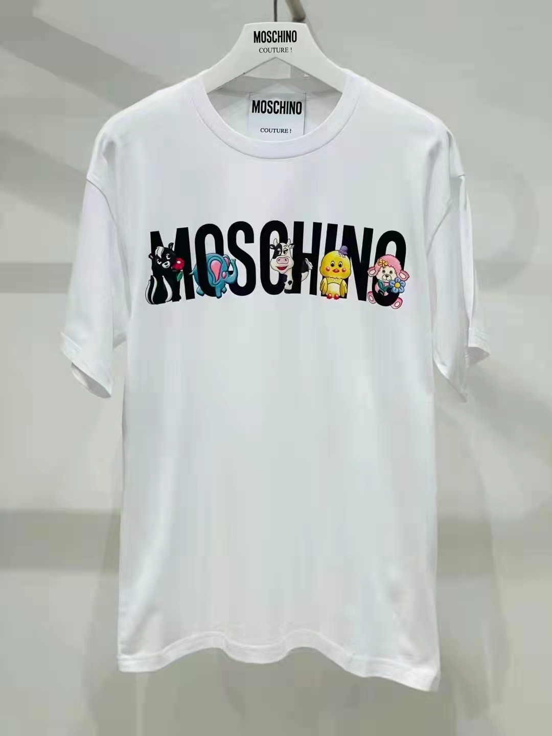 Online Sales
 Moschino Top
 Clothing T-Shirt Black White Spring/Summer Collection Short Sleeve