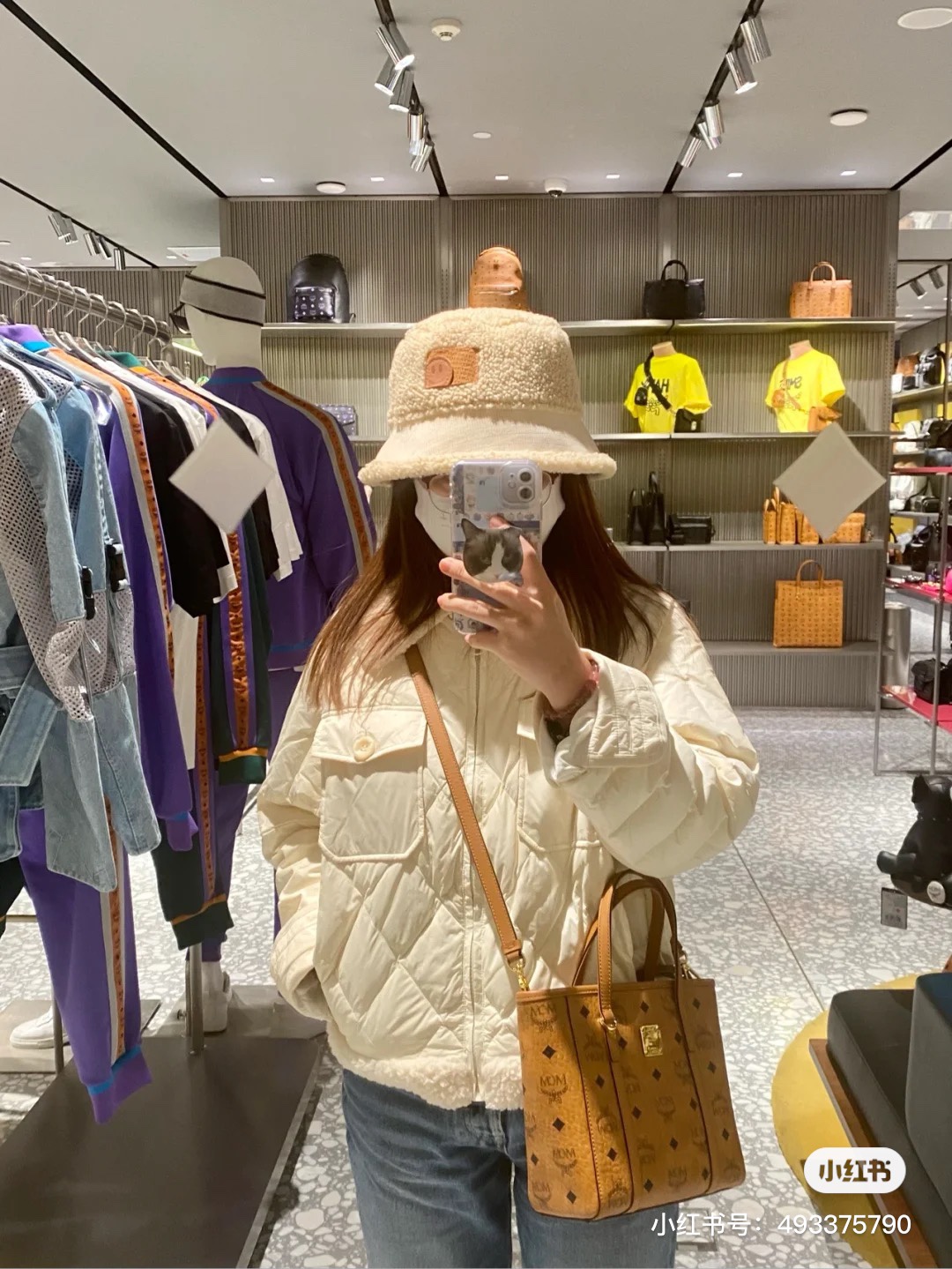 Vintage-inspired bucket bag crafted from monogram canvas, featuring an - Comprehensive 3