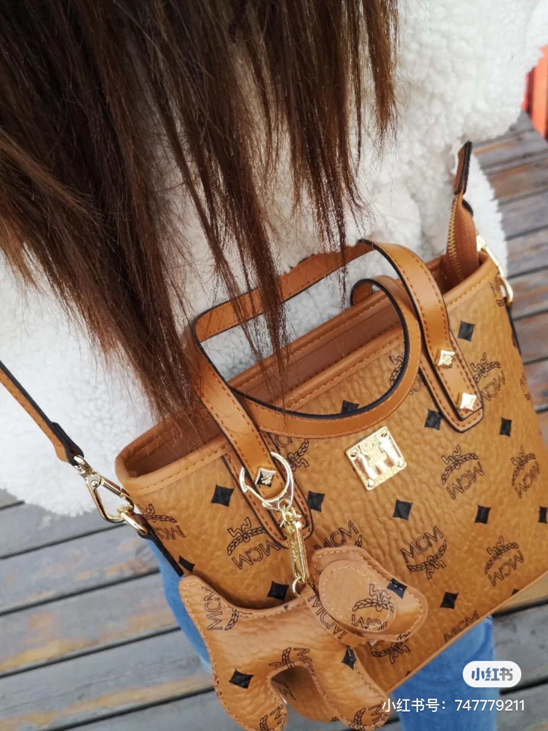 Vintage-inspired bucket bag crafted from monogram canvas, featuring an - Comprehensive 6