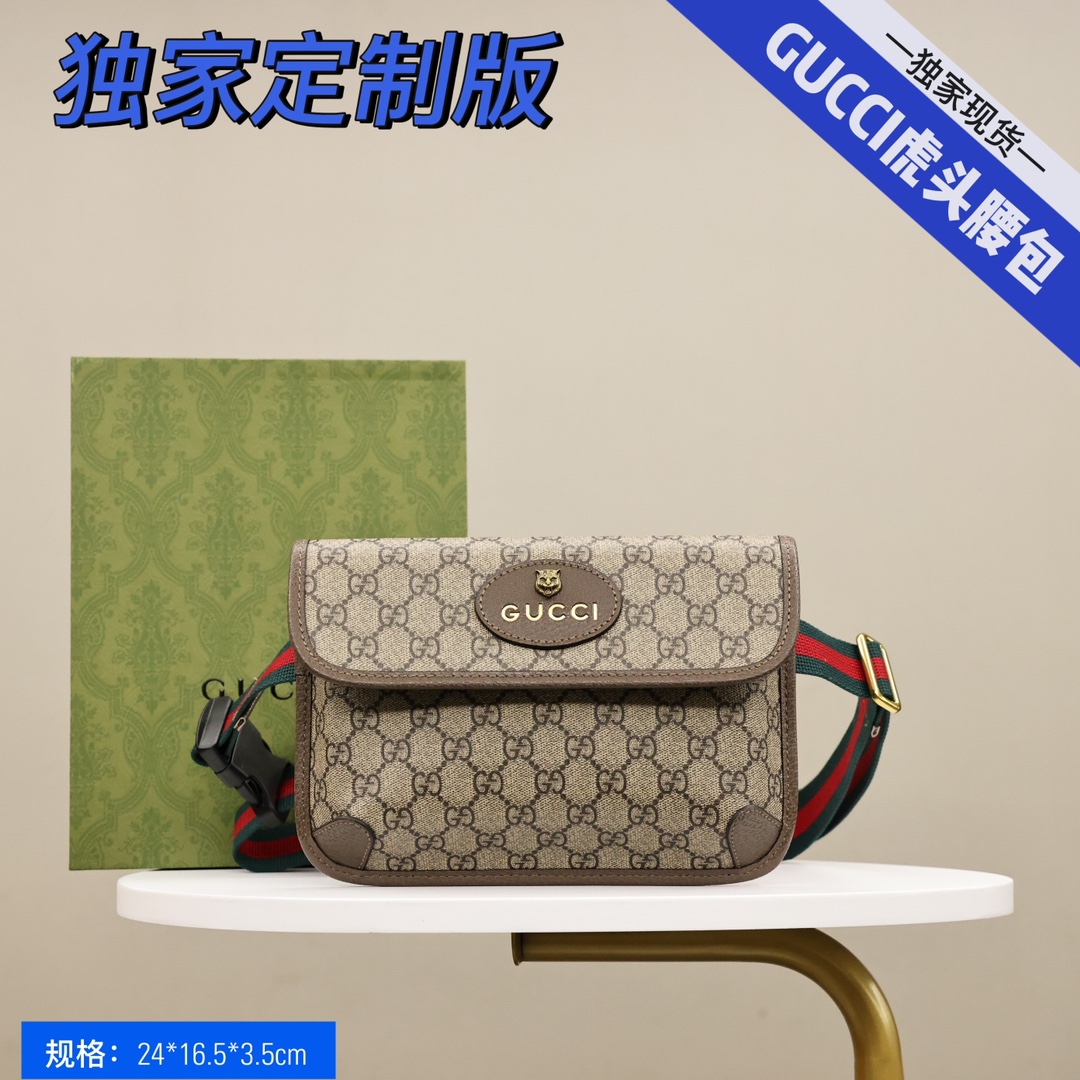 GUCCI 虎头腰包💰190 男女通用款.采用GG Supreme高级人造帆布制作.配以复古风格设计.款式采用皮革滚边.可以缠腰佩戴.配以织带和搭扣确保安全. 规格: 24*16.5*3.5cm