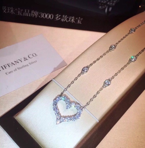 Tiffany & Co. Heart Pendant Necklace with Sparkling Diamonds in Sterling Silver 1 Tiffany & Co. Heart Pendant Necklace with Sparkling Diamonds in Sterling Silver
