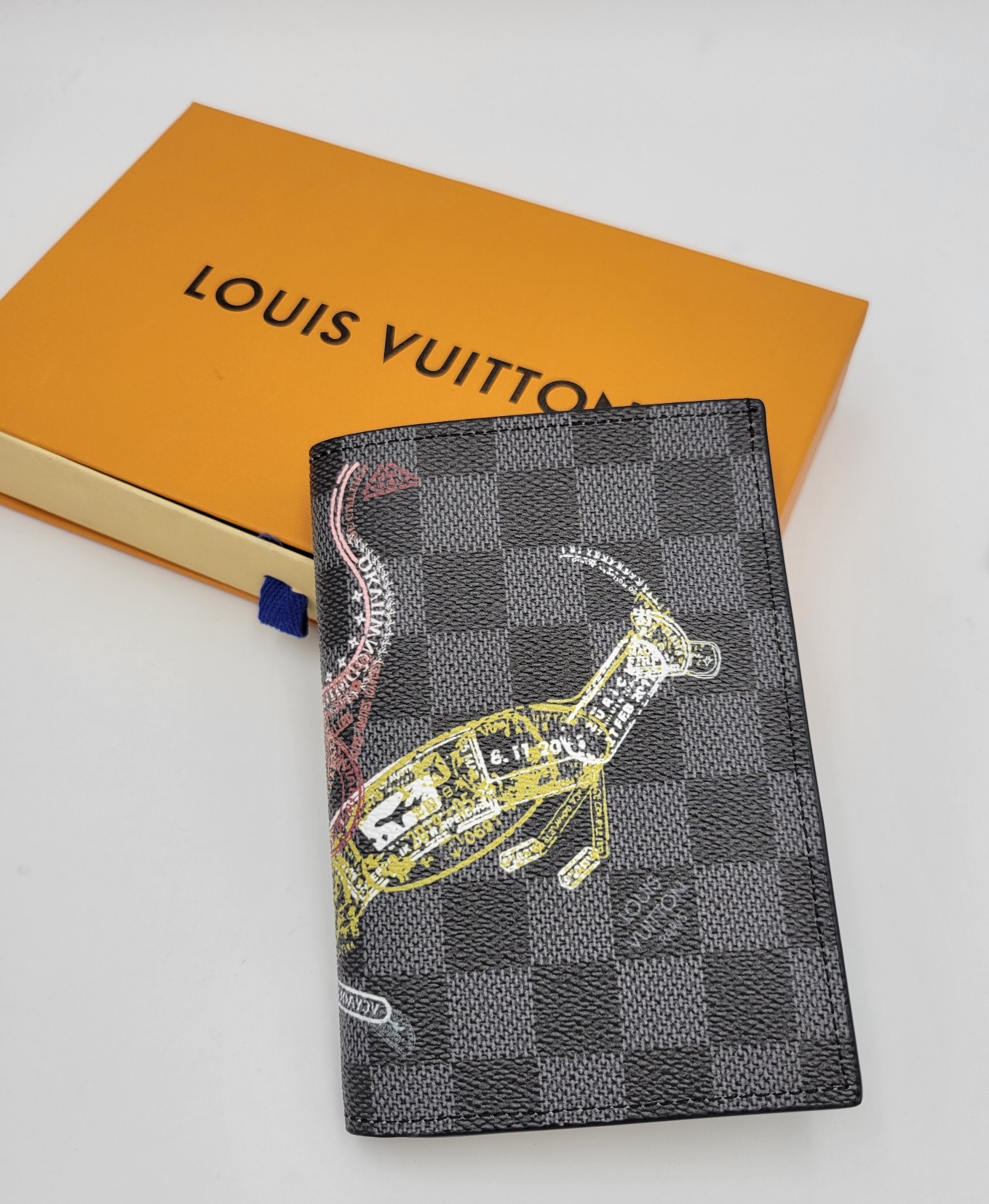 Open view of a leather passport holder with passport inside