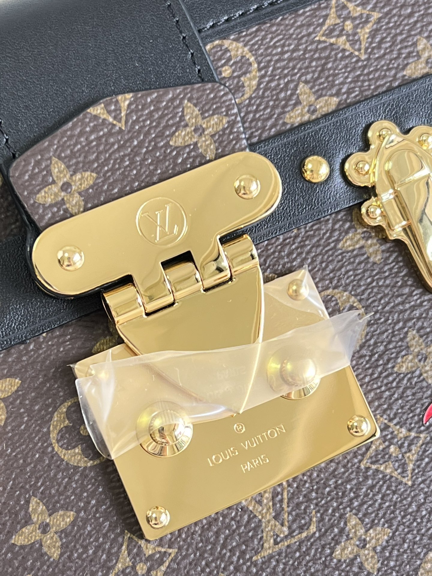 Every detail of this Petite Malle handbag is inspired by Louis Vuitton's - Bag 3