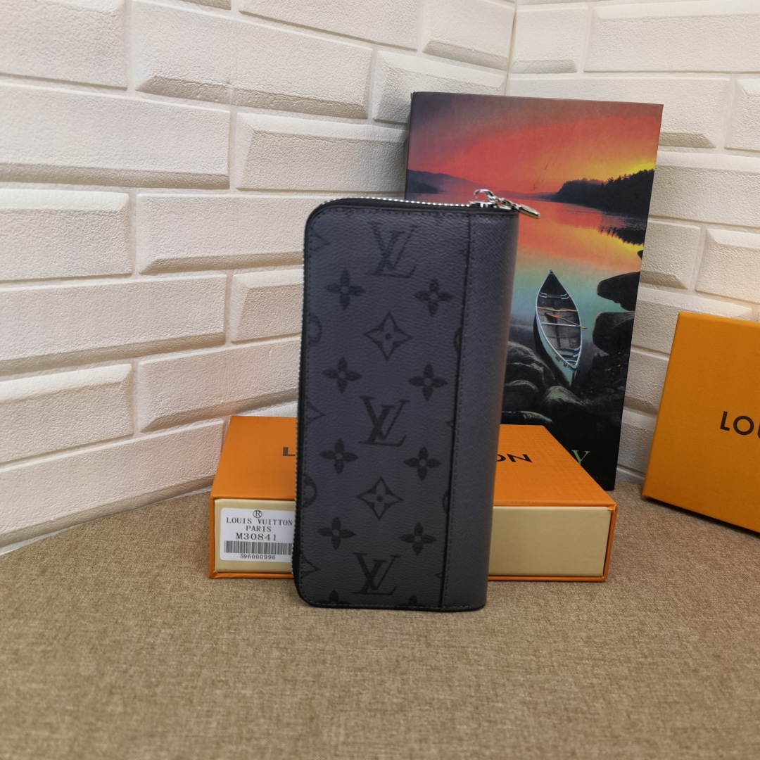 Side view of the long leather wallet showing thickness